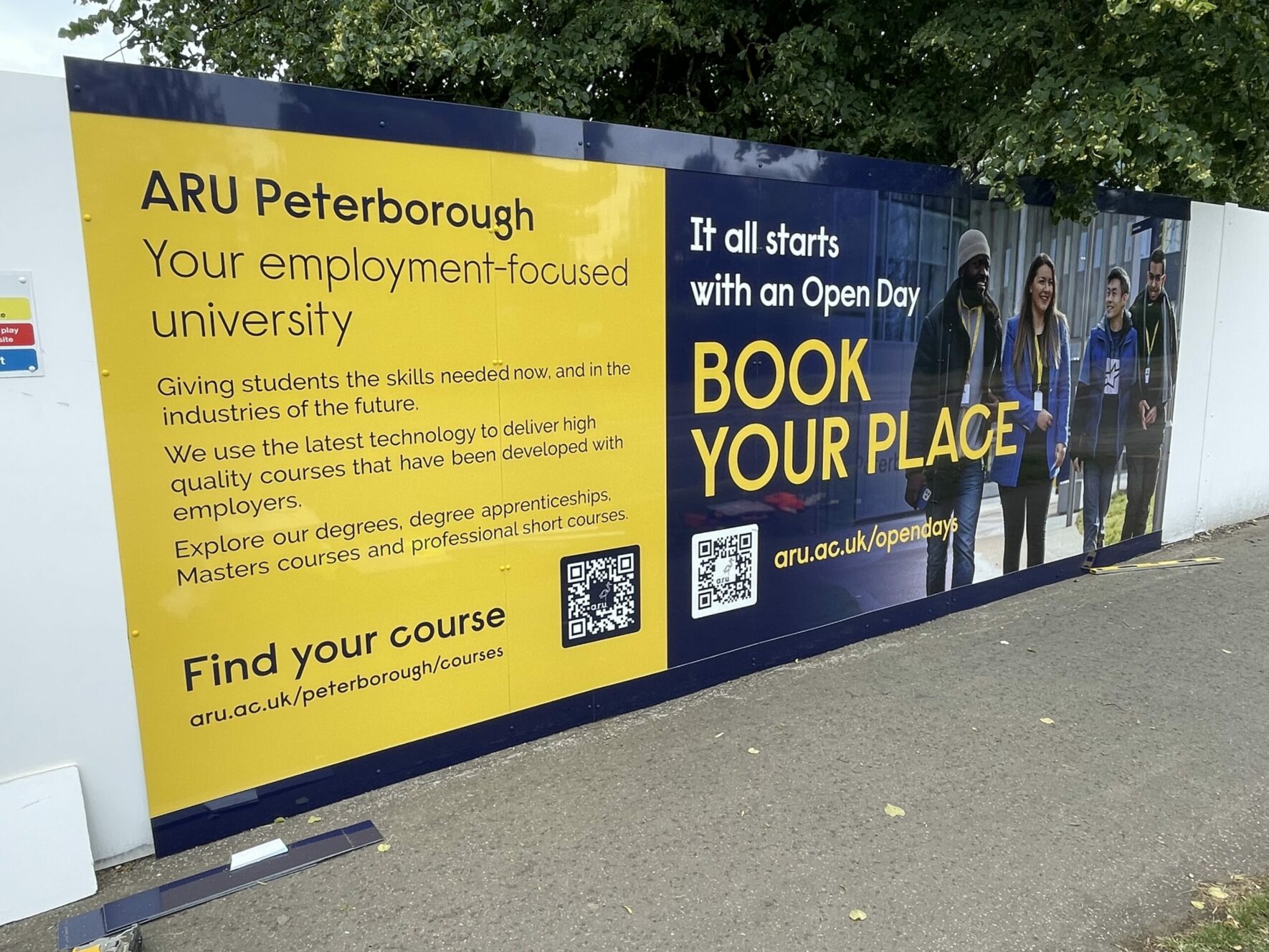 Anglia Ruskin University (ARU) Peterborough construction panels with site advertising
